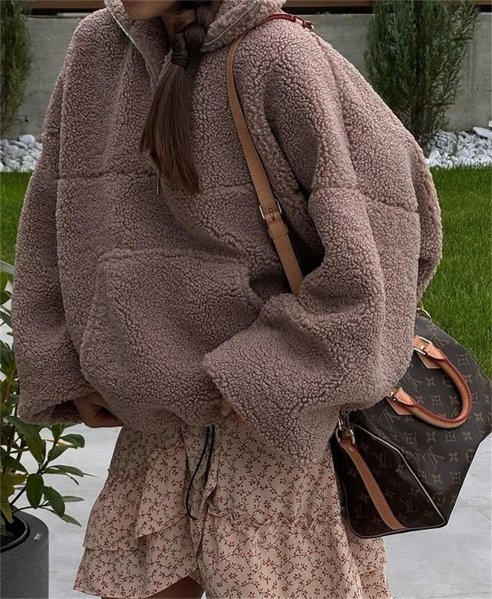 Kvinnors mysiga fleece-tröja med halv dragkedja och elastiska ärmar Mirla-Eva Jonsson