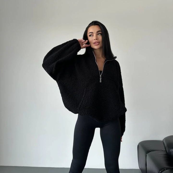 Kvinnors mysiga fleece-tröja med halv dragkedja och elastiska ärmar Mirla-Eva Jonsson
