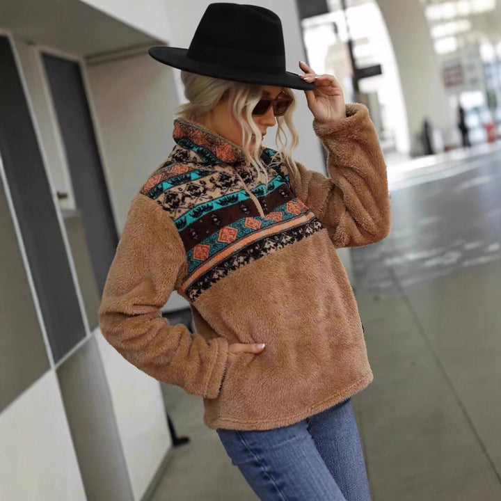 Kvinnors mysiga fleecepullover med fashionabel dragkedja och färgdesign Mirla-Eva Jonsson