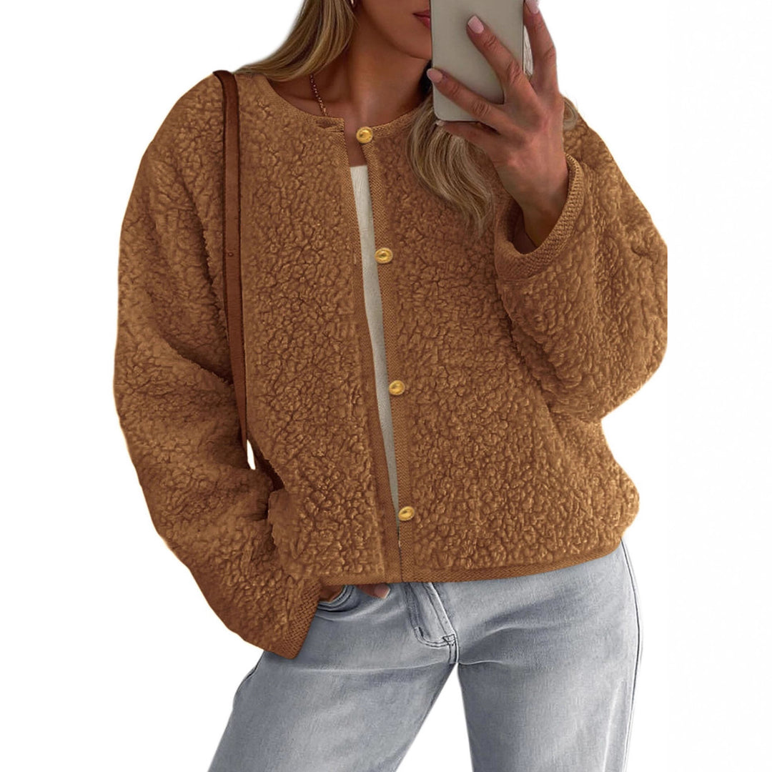 Kvinnors mysiga fleecjacka med knapppdetailj och oversized passform Mirla-Eva Jonsson