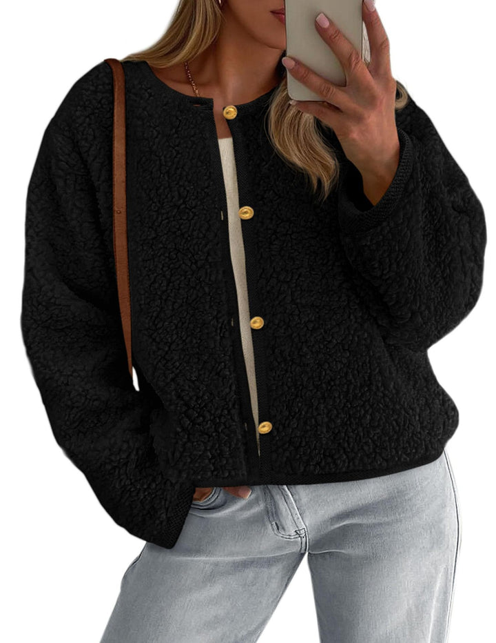 Kvinnors mysiga fleecjacka med knapppdetailj och oversized passform Mirla-Eva Jonsson