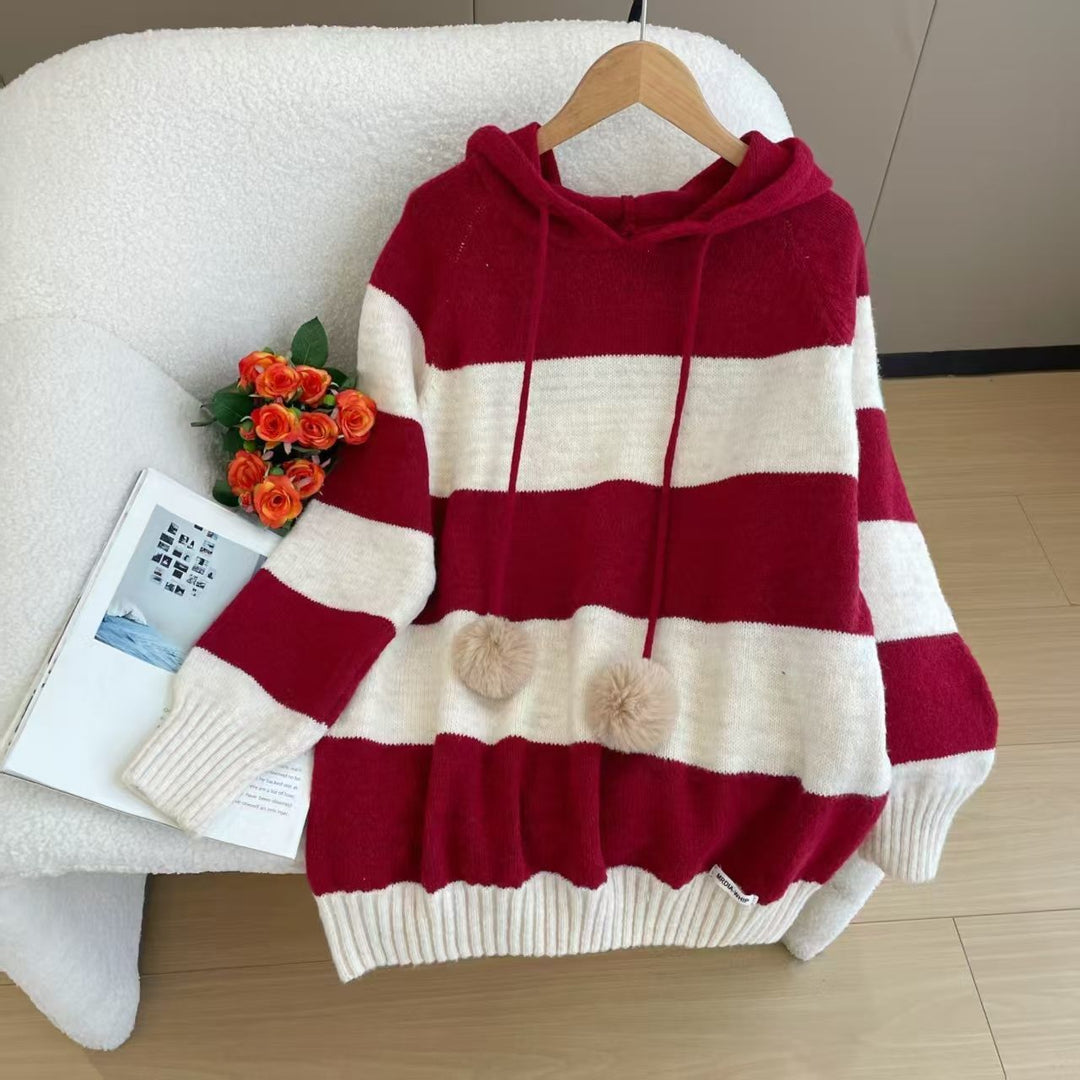 Kvinnors mysiga hoodie med randig design och trendig pom pom.-Eva Jonsson