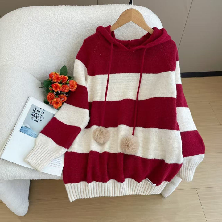 Kvinnors mysiga hoodie med randig design och trendig pom pom.-Eva Jonsson
