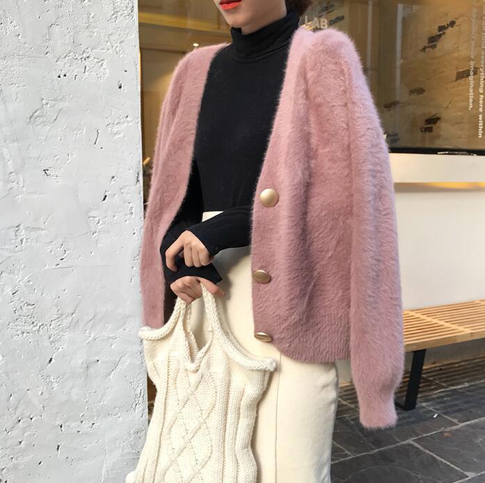 Kvinnors mysiga kofta med stora knappar och oversized passform Mirla-Eva Jonsson