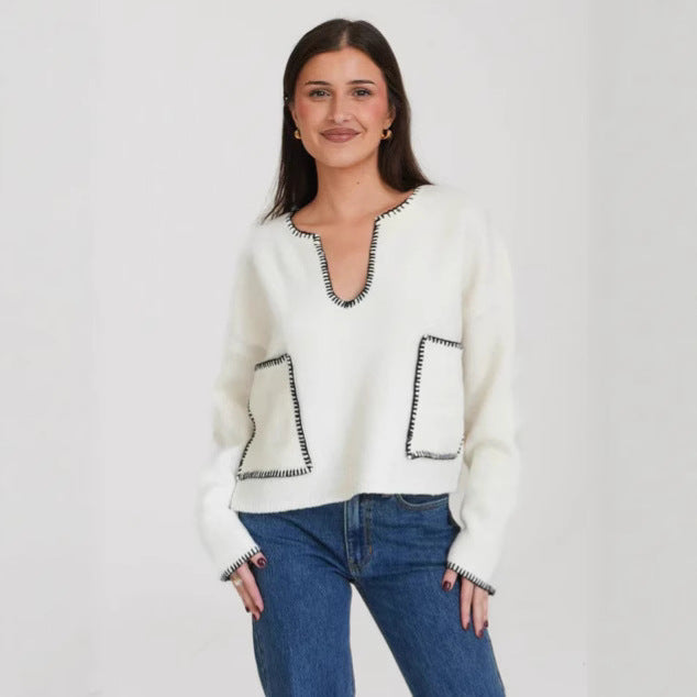Kvinnors mysiga korta tröja med asymmetrisk design och praktiska fickor Mirla-Eva Jonsson