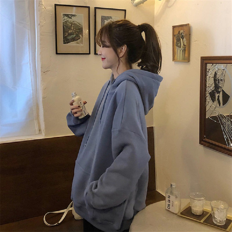 Kvinnors mysiga oversized hoodie med hög krage och praktiska kängurufickor Mirla-Eva Jonsson