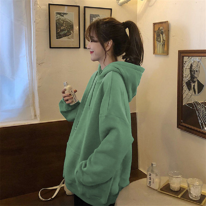 Kvinnors mysiga oversized hoodie med hög krage och praktiska kängurufickor Mirla-Eva Jonsson