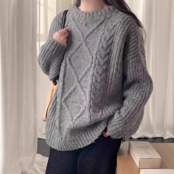 Kvinnors mysiga oversized tröja gjord av finstickad Mirla-Eva Jonsson