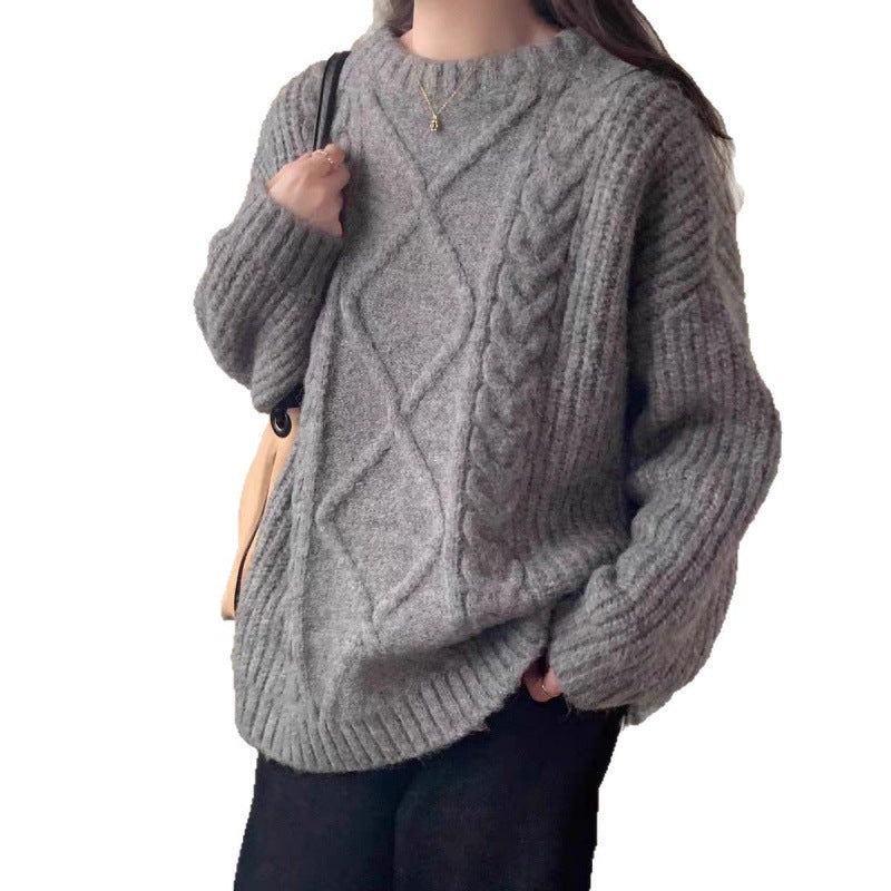 Kvinnors mysiga oversized tröja gjord av finstickad Mirla-Eva Jonsson