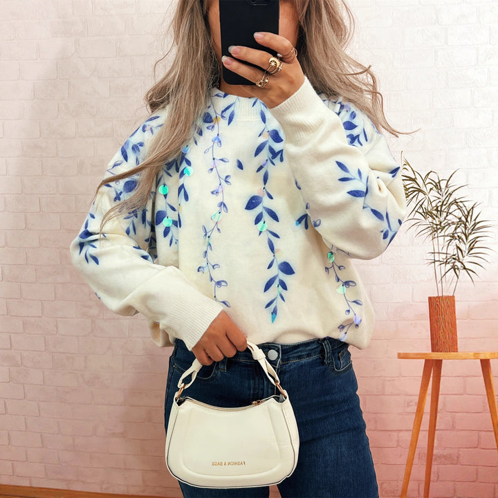 Kvinnors mysiga oversized tröja med blommig applikédesign Mirla-Eva Jonsson