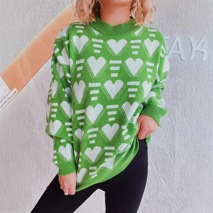 Kvinnors mysiga oversized tröja med hjärtformad mönster Mirla-Eva Jonsson