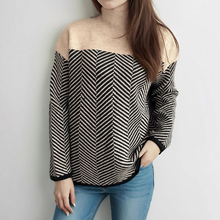 Kvinnors mysiga polotröja med modernt herringbone-mönster och elastiska ärmar Mirla-Eva Jonsson