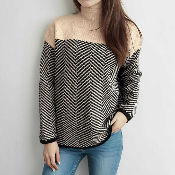 Kvinnors mysiga polotröja med modernt herringbone-mönster och elastiska ärmar Mirla-Eva Jonsson