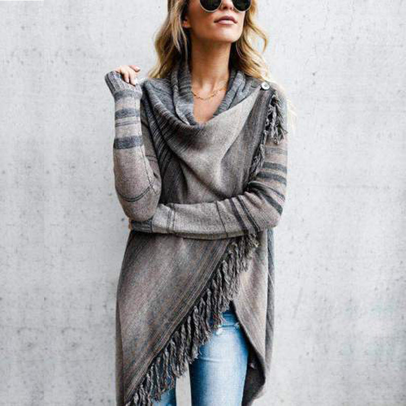 Kvinnors mysiga poncho med fransar Mirla-Eva Jonsson