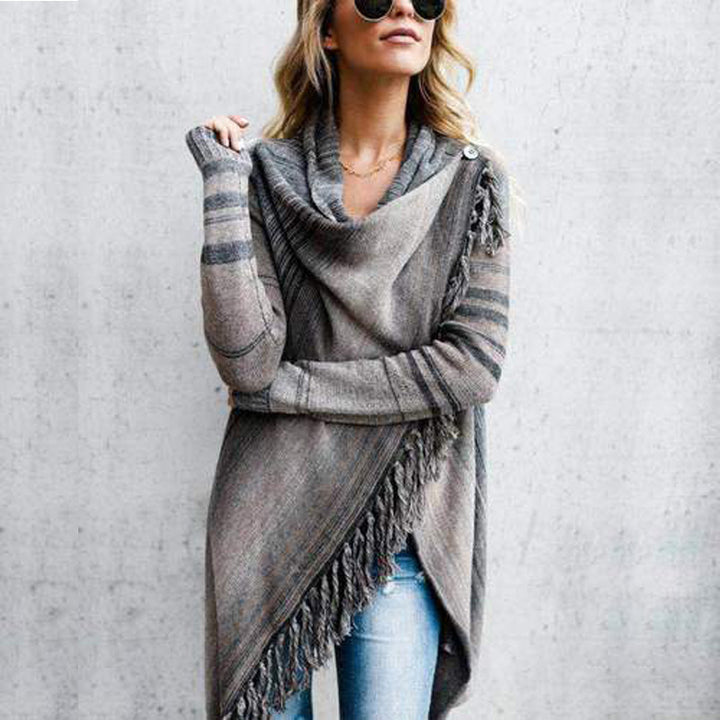 Kvinnors mysiga poncho med fransar Mirla-Eva Jonsson