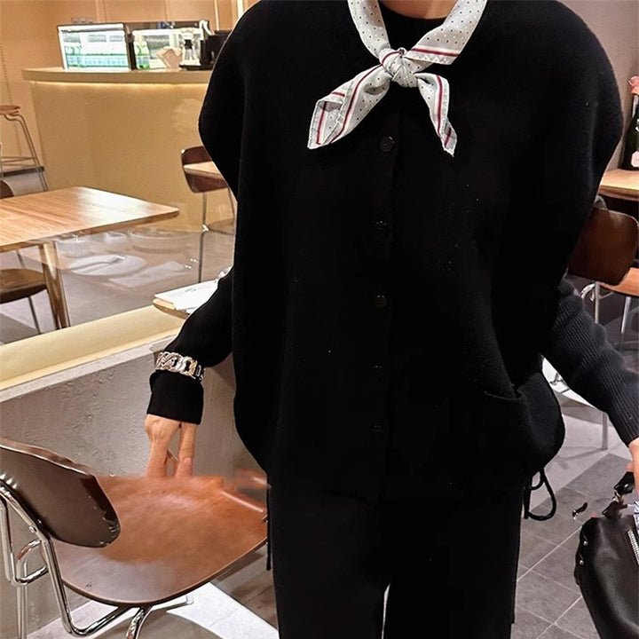 Kvinnors mysiga stickade blazer med knäppning och fickor Mirla-Eva Jonsson