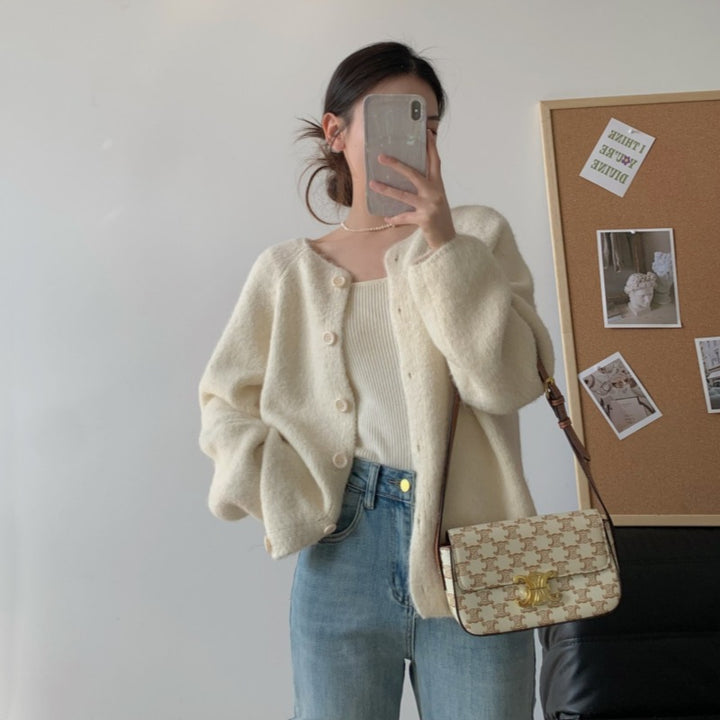 Kvinnors mysiga stickade cardigan med knappslå och bred passform Mirla-Eva Jonsson