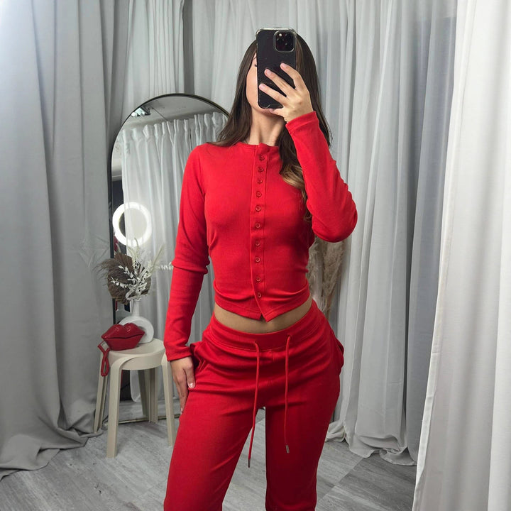 Kvinnors mysiga stickade jumpsuit med knapprar och elegant design Mirla-Eva Jonsson