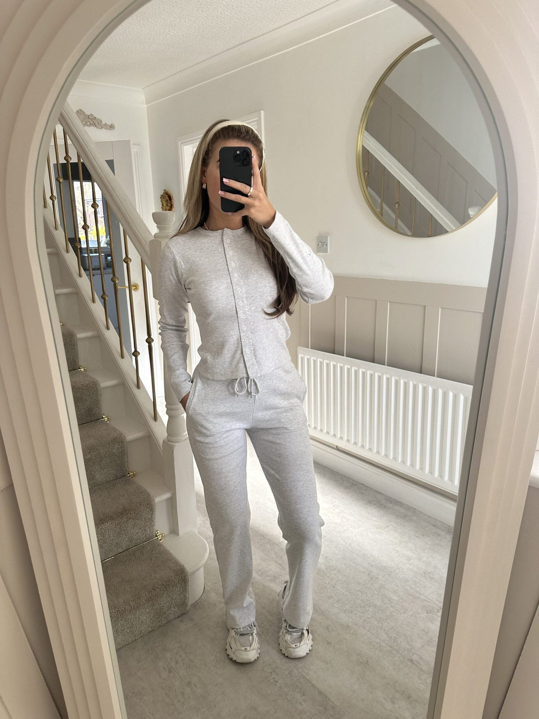 Kvinnors mysiga stickade jumpsuit med knapprar och elegant design Mirla-Eva Jonsson