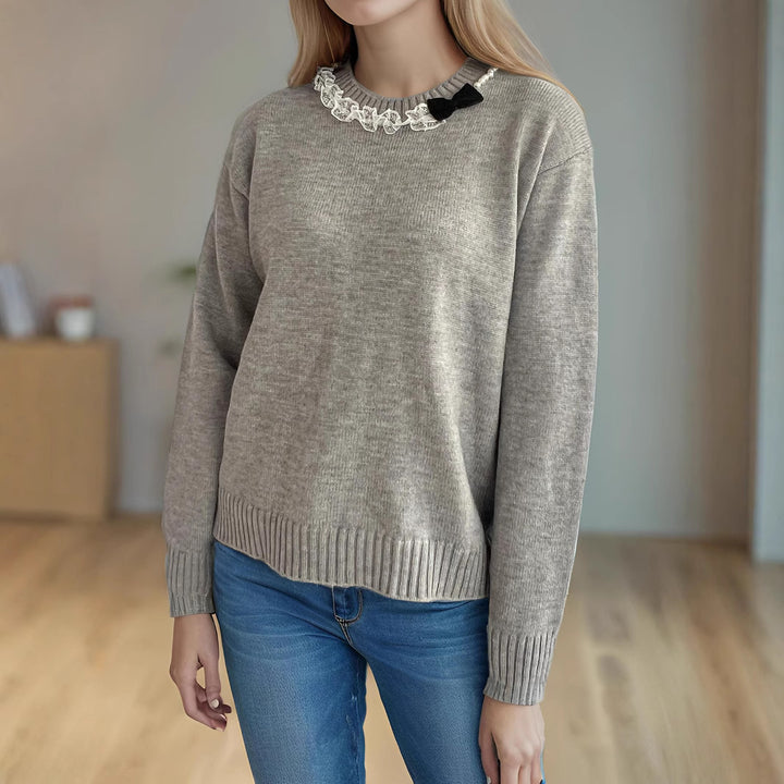 Kvinnors mysiga stickade tröja med volangdetaljer Mirla-Eva Jonsson