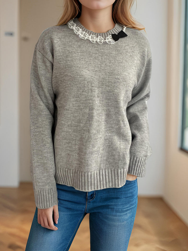 Kvinnors mysiga stickade tröja med volangdetaljer Mirla-Eva Jonsson
