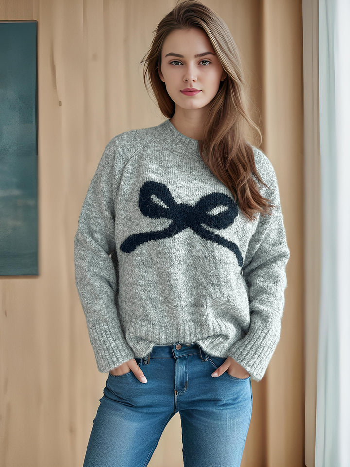 Kvinnors mysiga tröja med rosettmotiv Mirla-Eva Jonsson