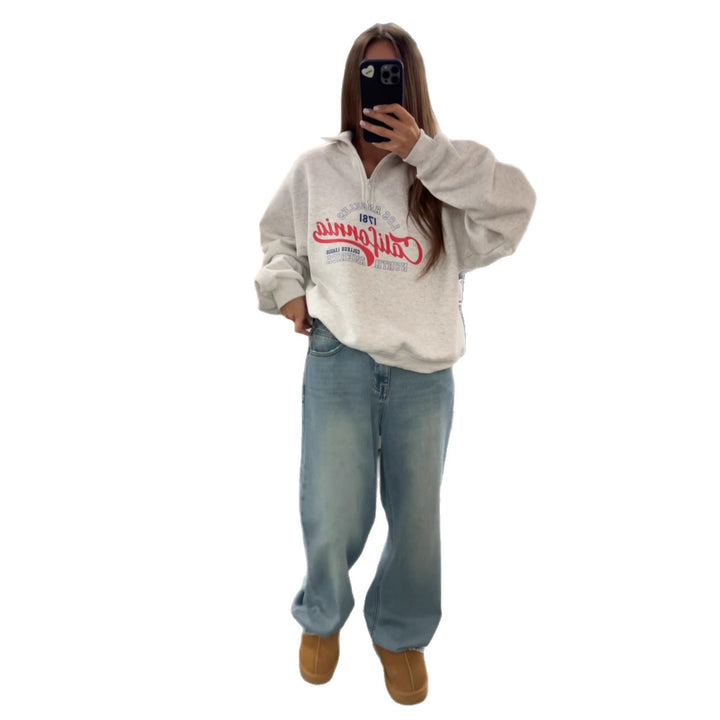 Kvinnors mysiga zip hoodie med cool grafisk tryck och hög krage Mirla-Eva Jonsson