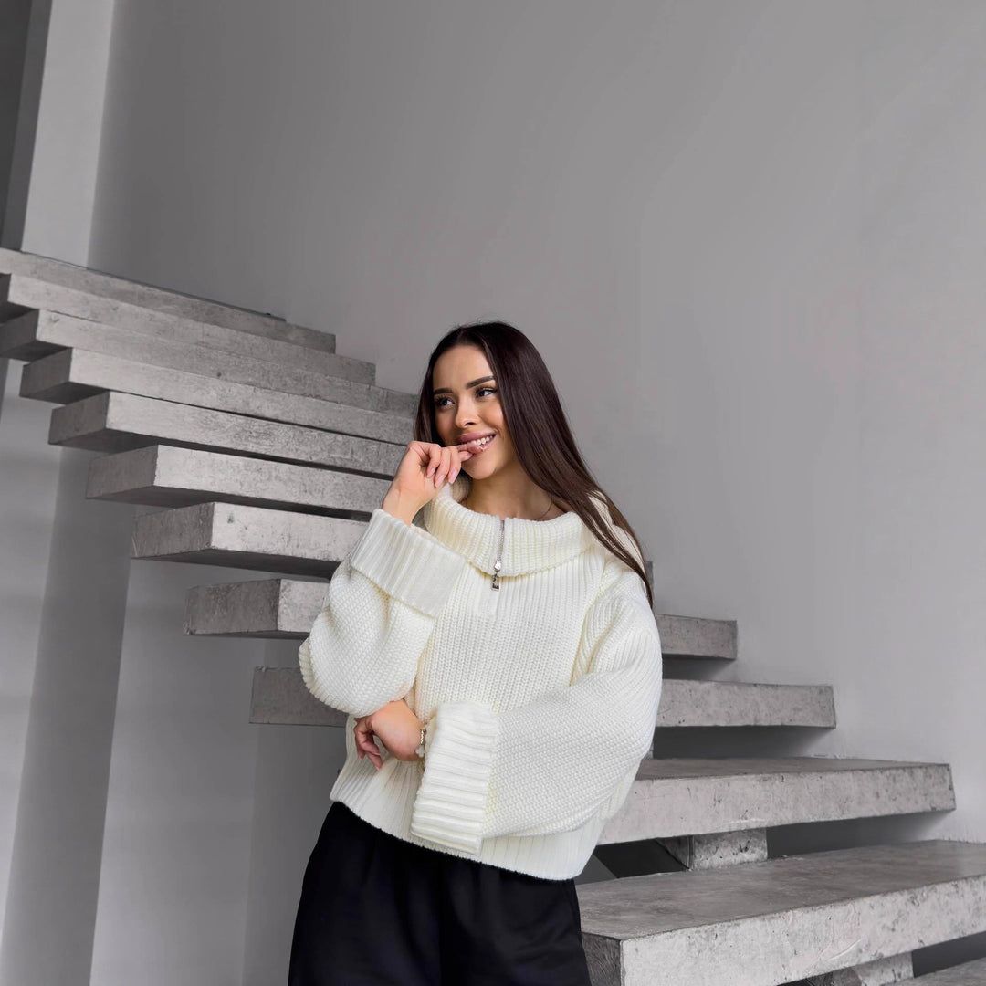 Kvinnors mysiga zip-tröja med breda ärmslut Mirla-Eva Jonsson