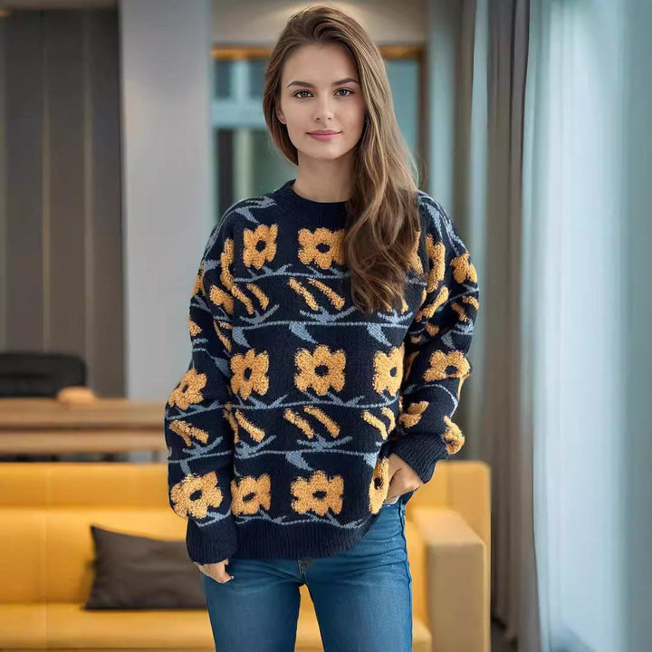 Kvinnors mysigt stickad tröja med blommiga 3D-applikationer Mirla-Eva Jonsson