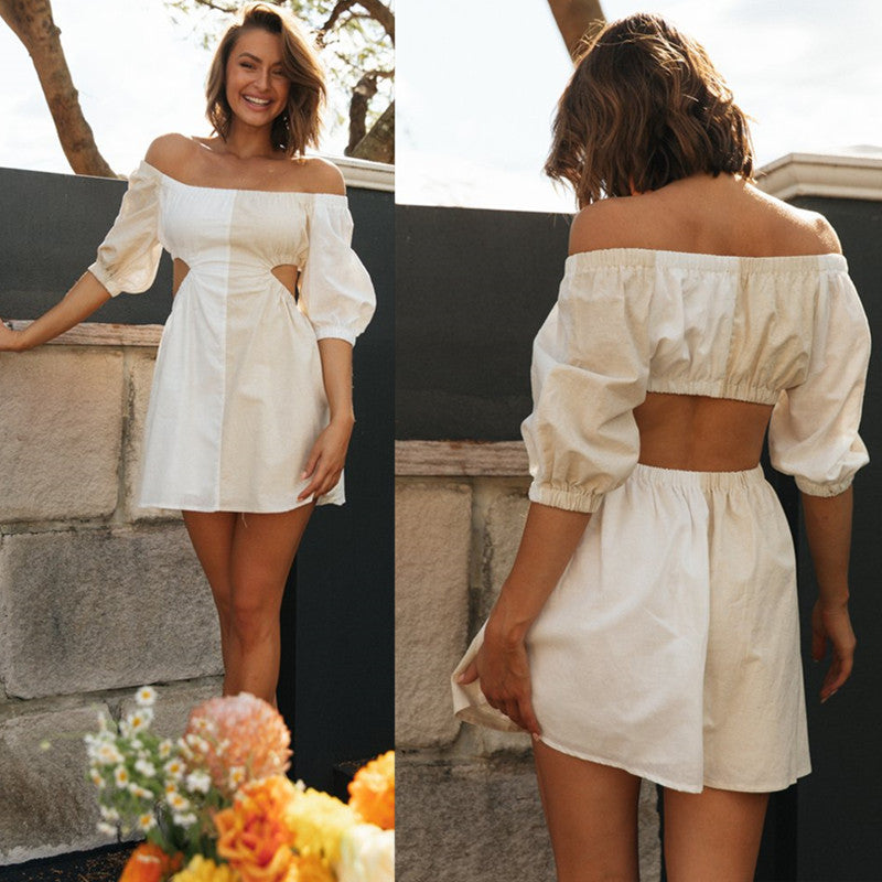 Kvinnors off-shoulder mini klänning med utskärningar och puffärmar Mirla-Eva Jonsson