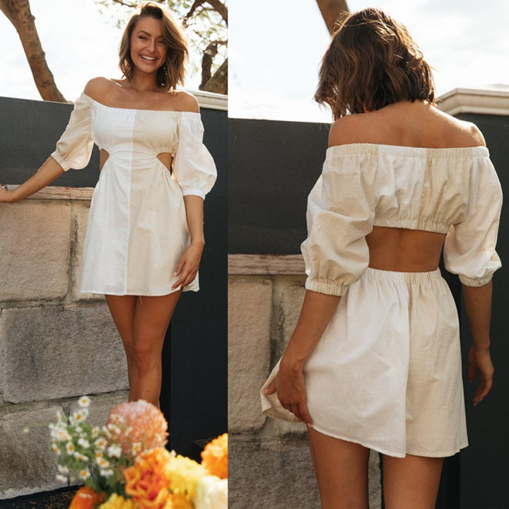 Kvinnors off-shoulder mini klänning med utskärningar och puffärmar Mirla-Eva Jonsson
