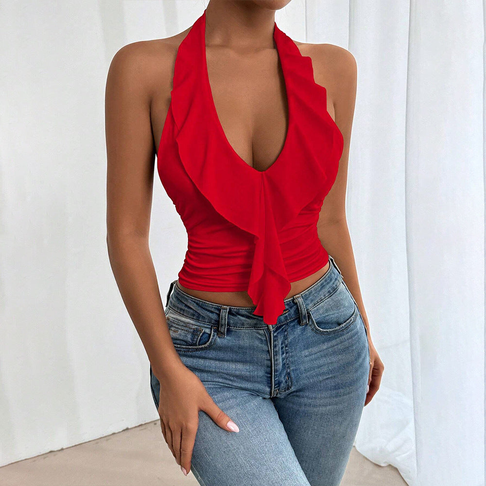 Kvinnors off-shoulder topp med flödande tyg och elegant volangdesign Mirla-Eva Jonsson