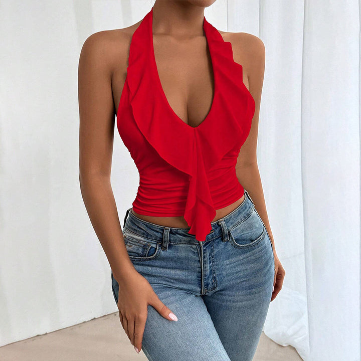 Kvinnors off-shoulder topp med flödande tyg och elegant volangdesign Mirla-Eva Jonsson