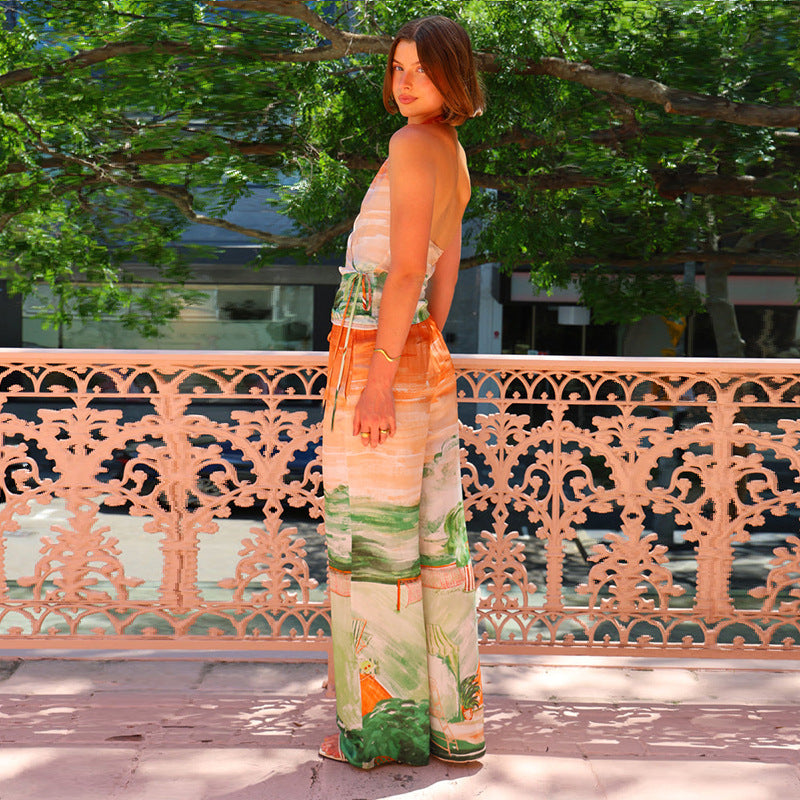 Kvinnors omlott jumpsuit med blommönster och elastisk midja Mirla-Eva Jonsson
