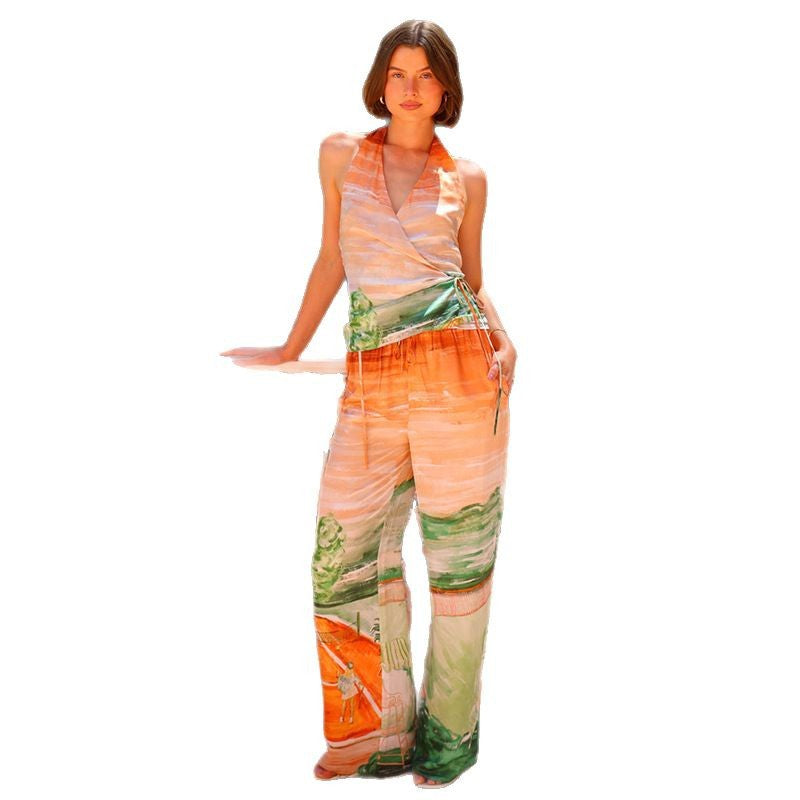 Kvinnors omlott jumpsuit med blommönster och elastisk midja Mirla-Eva Jonsson