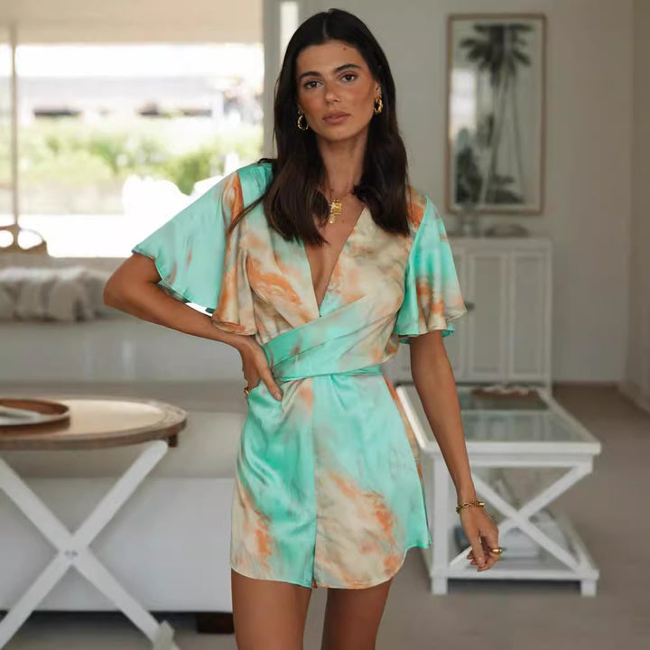 Kvinnors omslag jumpsuit med voluminösa ärmar och djup V-ringning Mirla-Eva Jonsson