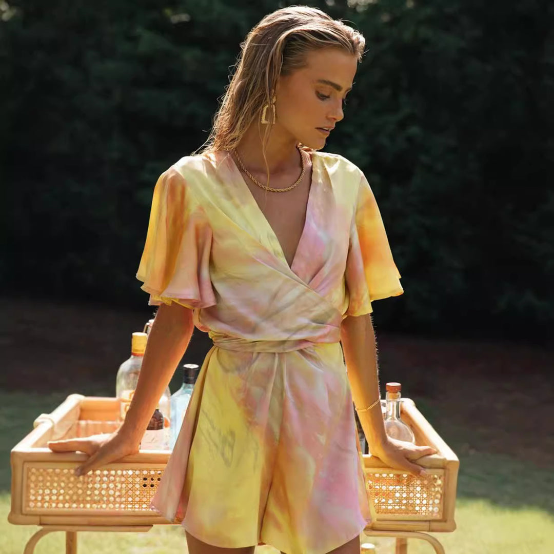 Kvinnors omslag jumpsuit med voluminösa ärmar och djup V-ringning Mirla-Eva Jonsson