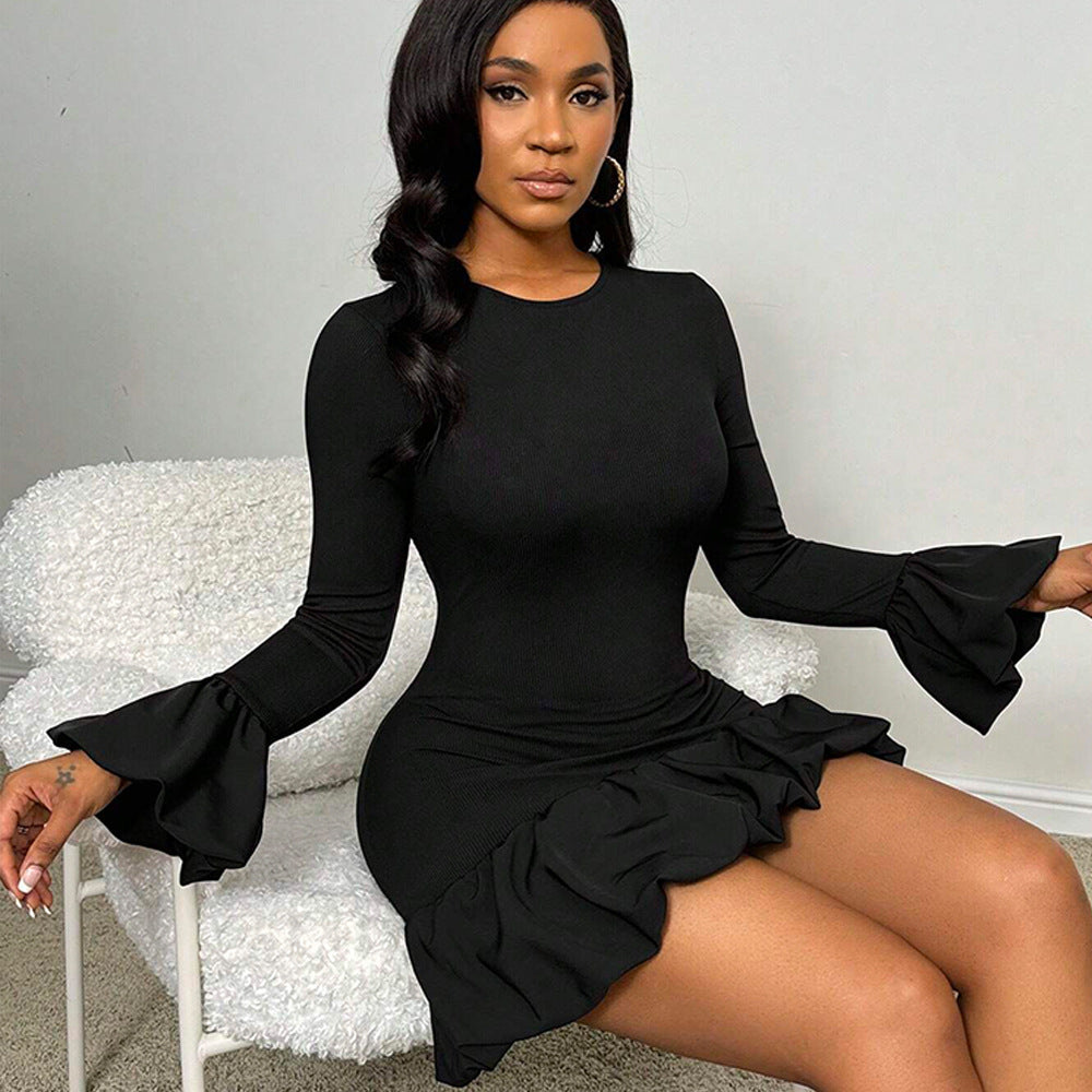 Kvinnors omslagklänning med eleganta vingsärmar och volangkant Mirla-Eva Jonsson