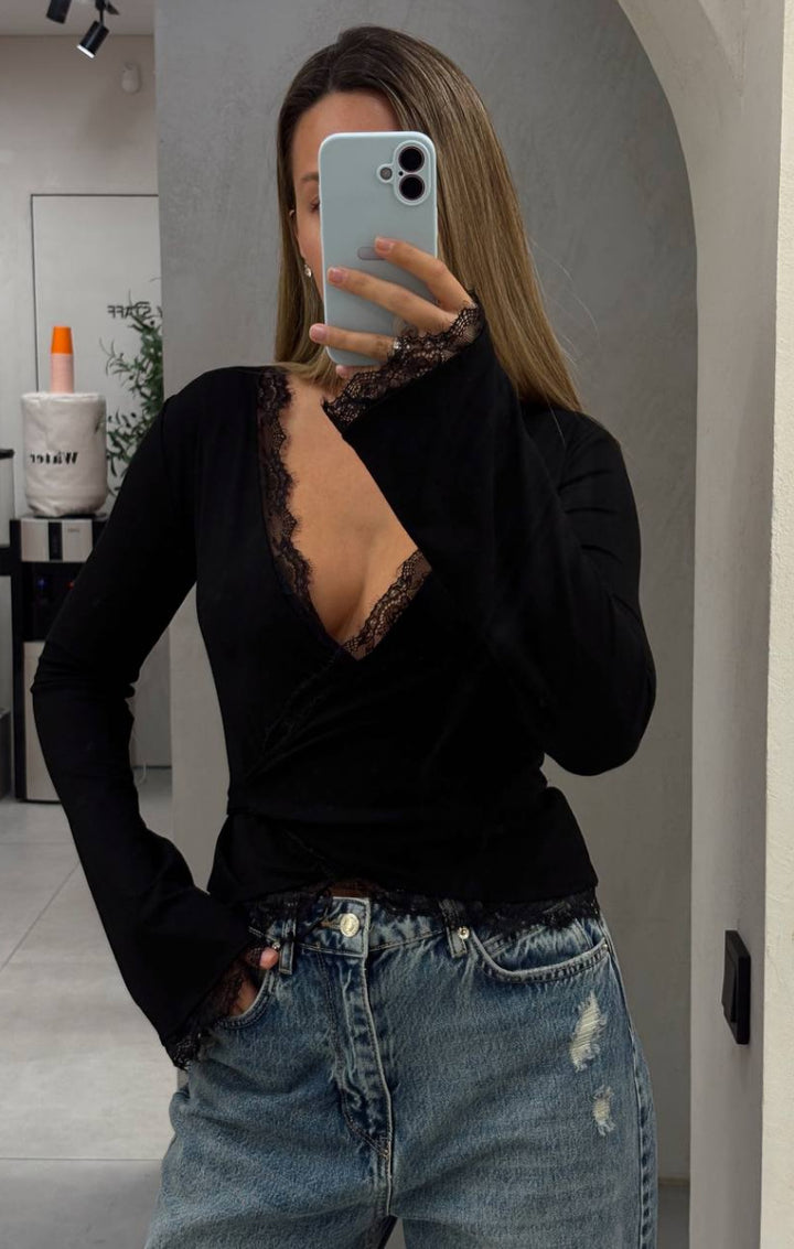 Kvinnors omslagstopp med elegant spetsdetalj Mirla-Eva Jonsson