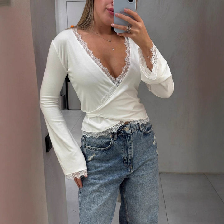 Kvinnors omslagstopp med elegant spetsdetalj Mirla-Eva Jonsson
