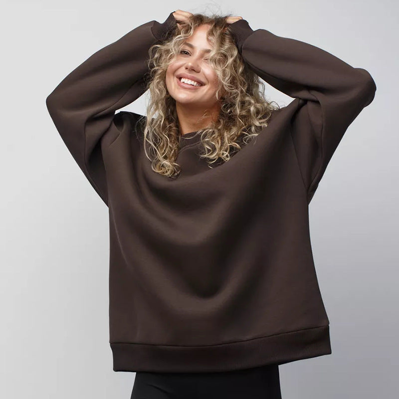 Kvinnors överdimensionerad sweatshirt med en avslappnad passform och vida ärmar Mirla-Eva Jonsson