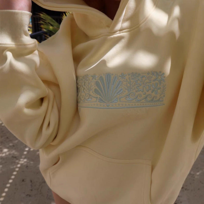 Kvinnors överdimensionerade hoodie med kreativa grafiska mönster och bekväm passform Mirla-Eva Jonsson