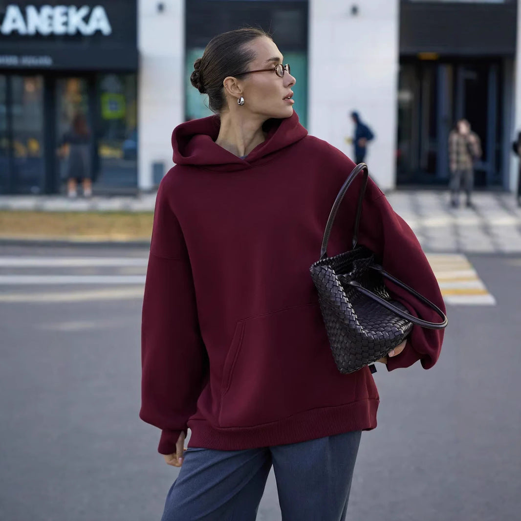 Kvinnors oversize hoodie med voluminösa ärmar och integrerad känguruficka Mirla-Eva Jonsson
