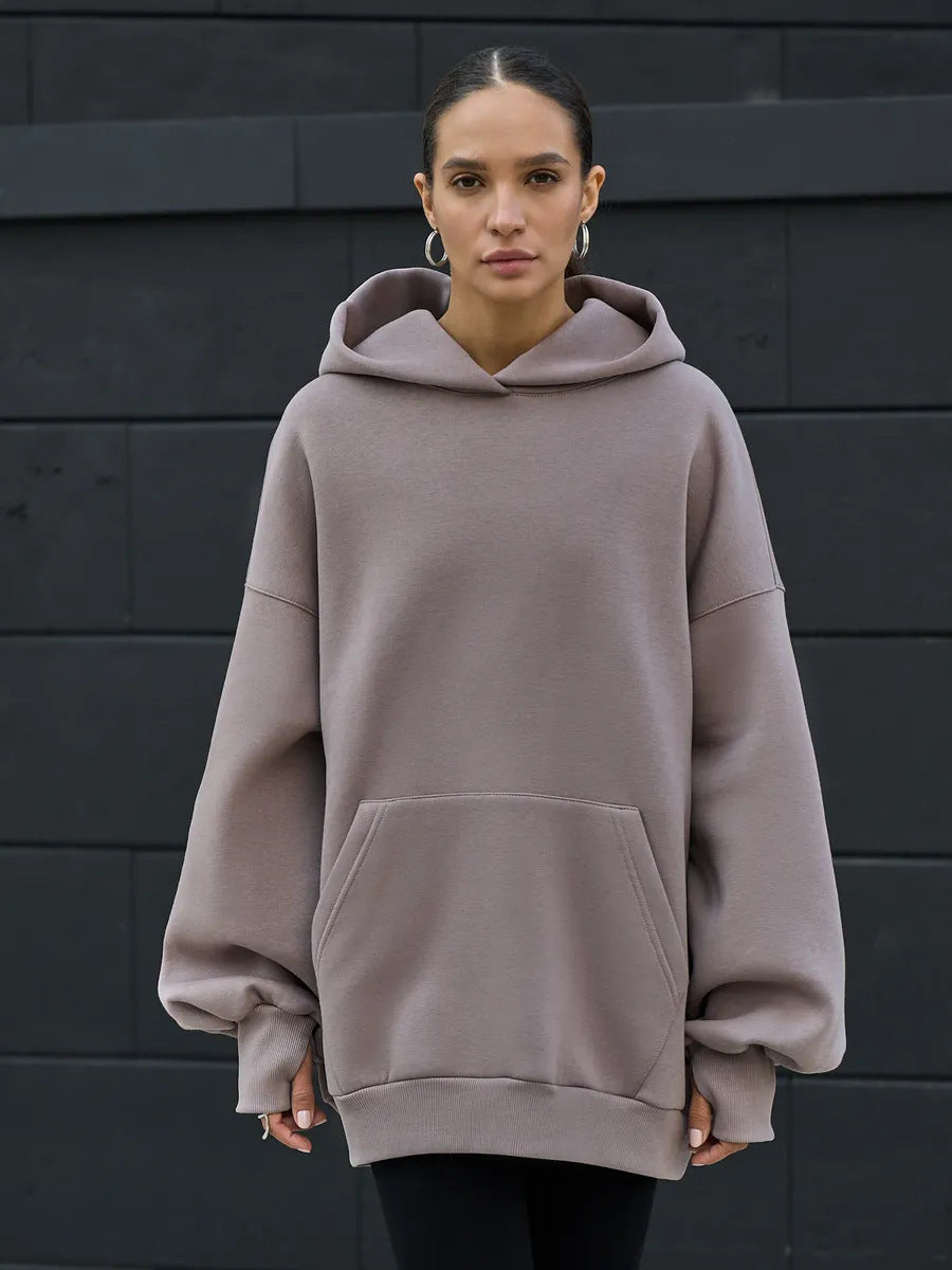 Kvinnors oversize hoodie med voluminösa ärmar och integrerad känguruficka Mirla-Eva Jonsson