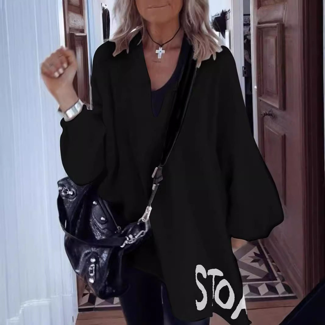 Kvinnors oversize skjorta med djup V-ringning och voluminösa ärmar Mirla-Eva Jonsson