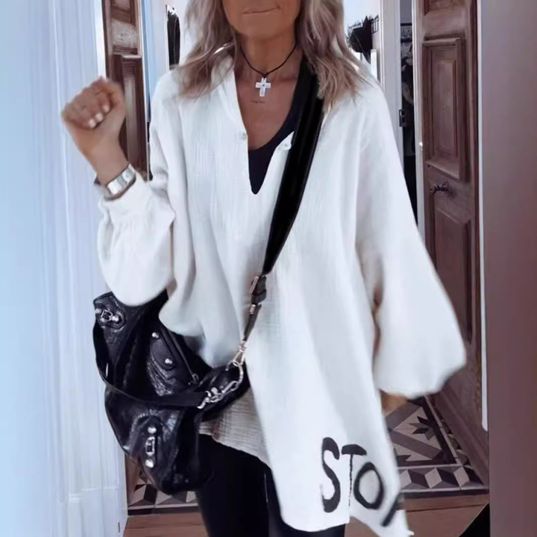 Kvinnors oversize skjorta med djup V-ringning och voluminösa ärmar Mirla-Eva Jonsson