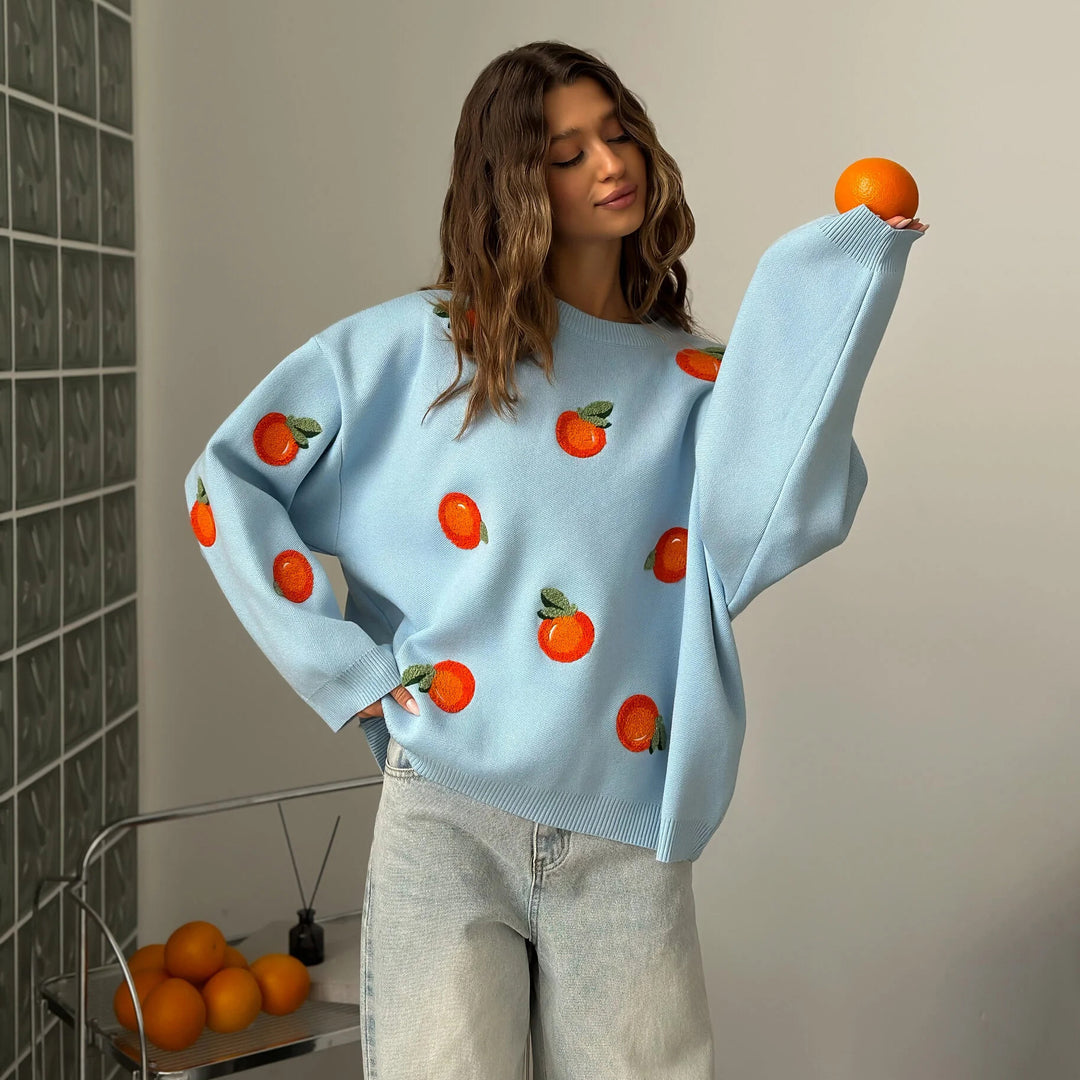 Kvinnors oversize-tröja med färgglada broderidetaljer Mirla-Eva Jonsson