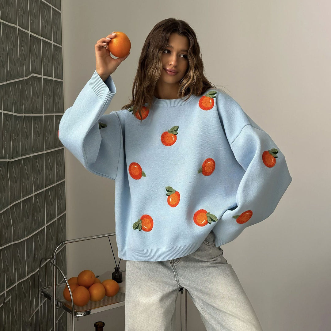 Kvinnors oversize-tröja med färgglada broderidetaljer Mirla-Eva Jonsson