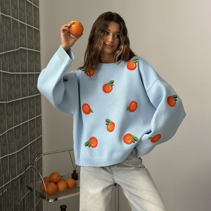 Kvinnors oversize-tröja med färgglada broderidetaljer Mirla-Eva Jonsson