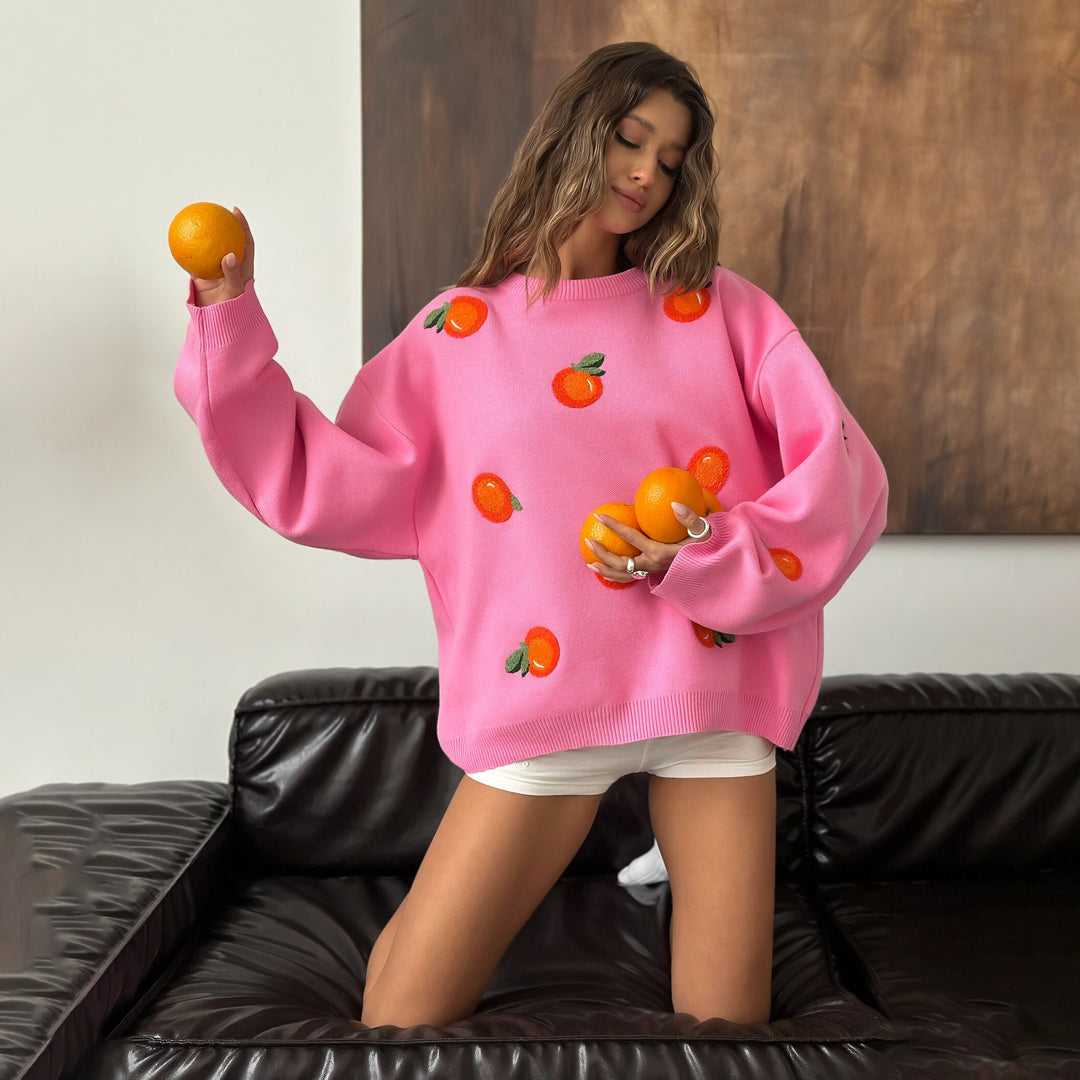 Kvinnors oversize-tröja med färgglada broderidetaljer Mirla-Eva Jonsson